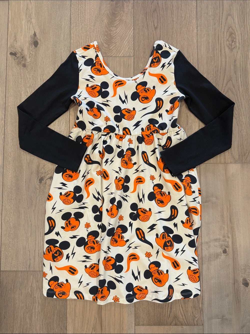 Rags to Raches Cream Dress with Orange & Black Character Print